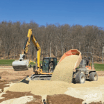 Ausa site dumper from Prime Equipment dumping sand and rocks